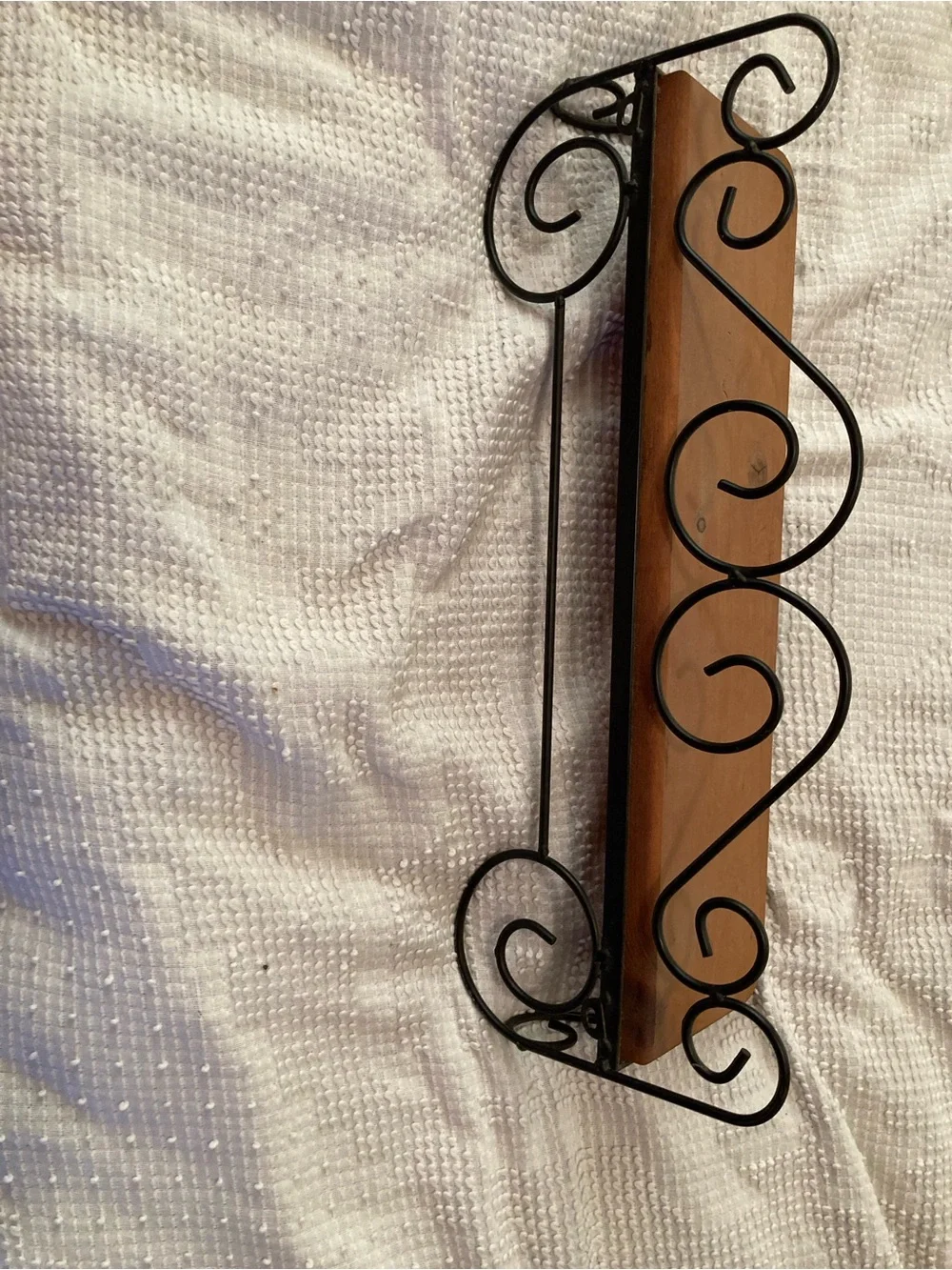 Vintage Wood Shelf with Decorative Black Metal Scroll Brackets